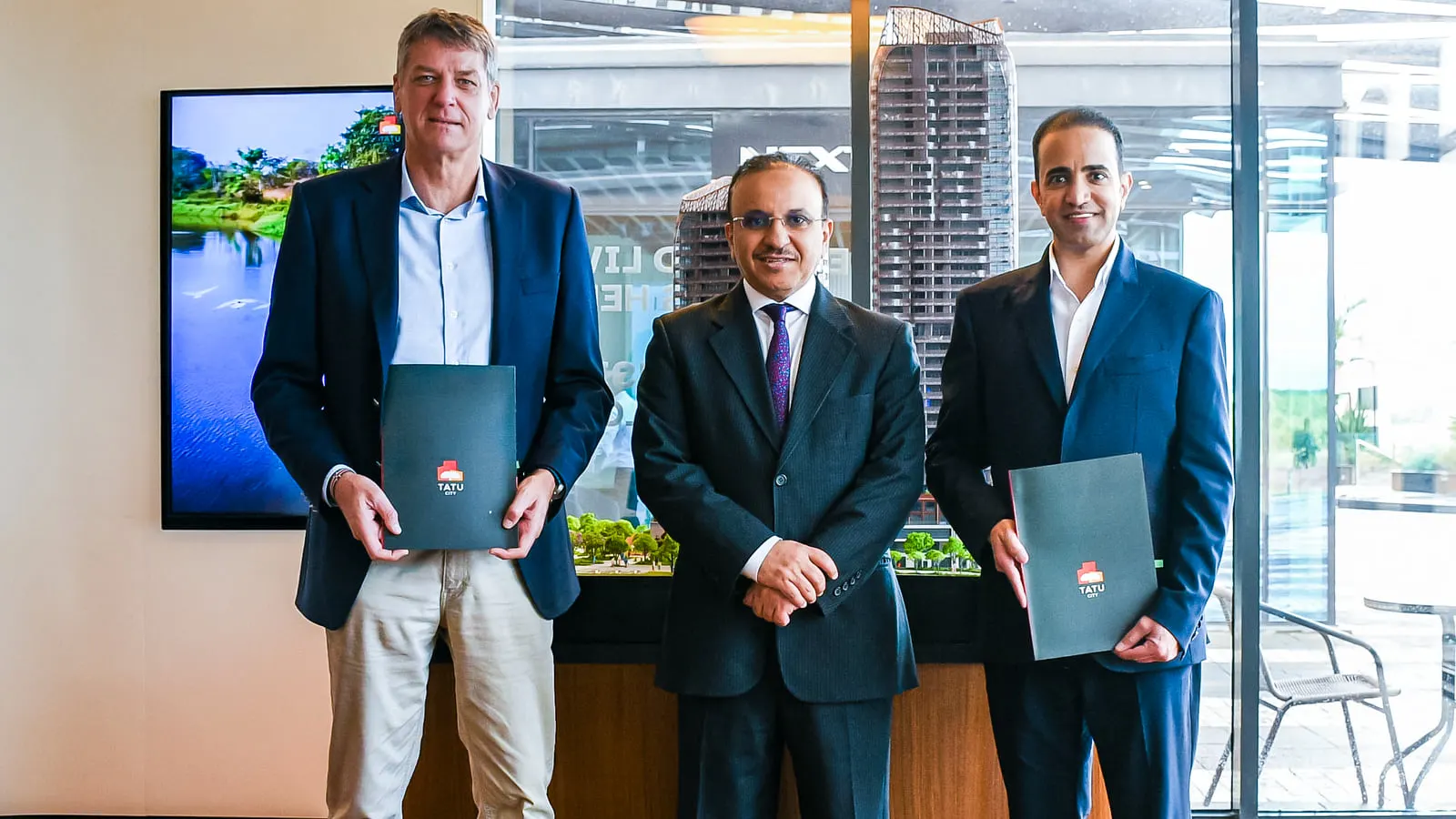 Representatives of Swan Properties and Rendeavour with the signed agreement at Tatu City